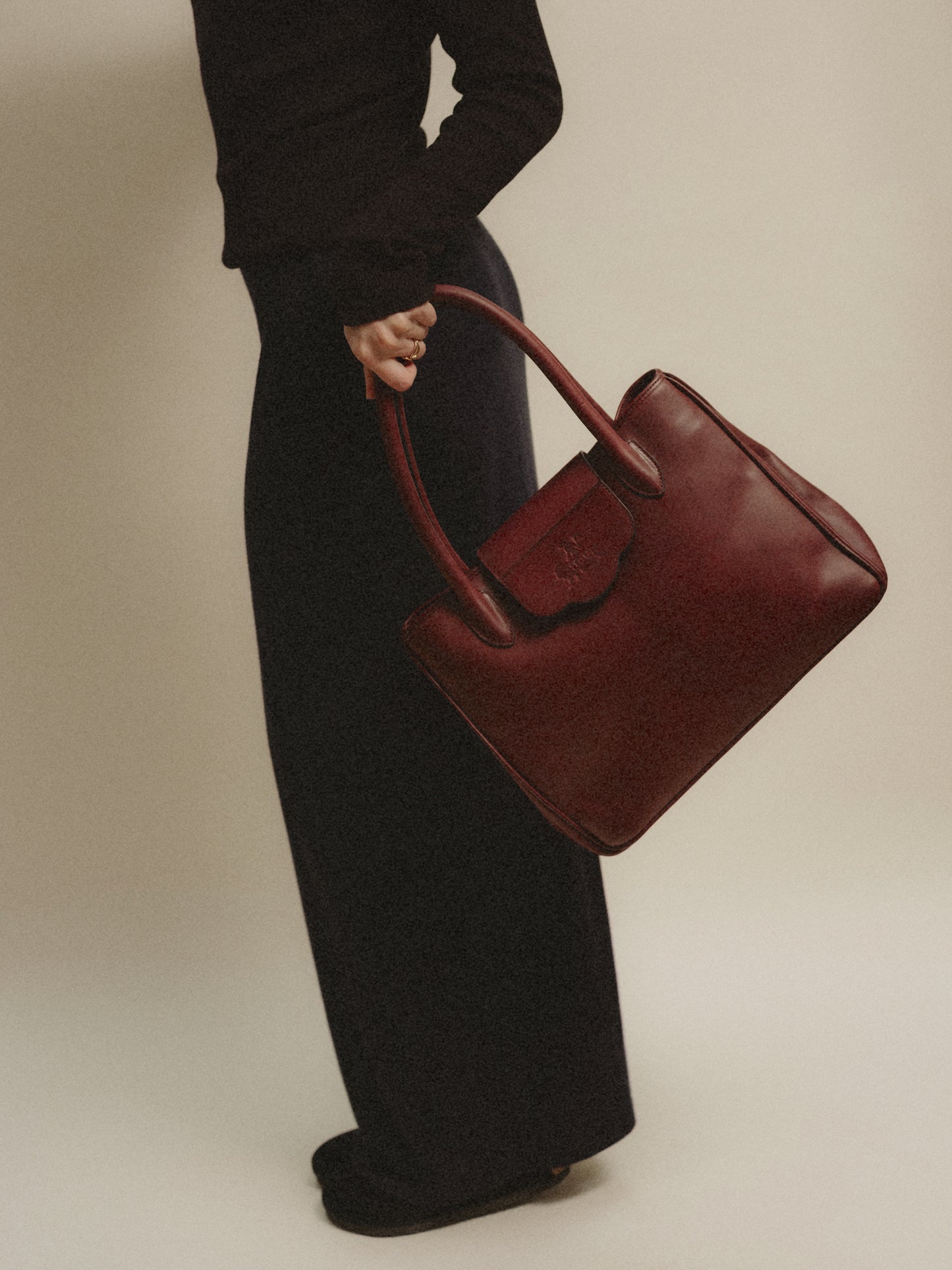 ''...EN SUISSE'' IN BURGUNDY RED